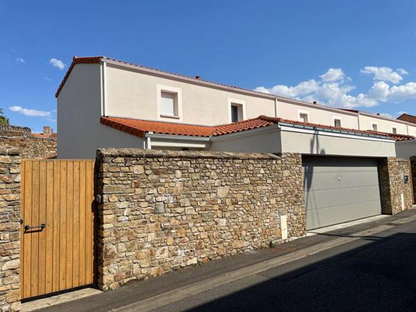 Maison récente 104 m2, 3 chambres, vie de plain-pied et garage 37 m2 à Paimboeuf