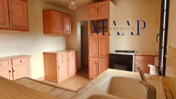 Maison 4 chambres 130m², terrain 1300m², garage