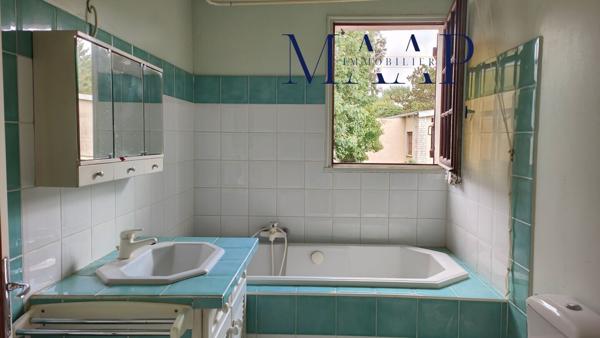 Maison 4 chambres 130m², terrain 1300m², garage