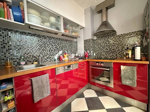 Appartement 5 pièce(s) 2 chambre(s) 90 m²