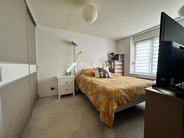 Appartement 5 pièce(s) 2 chambre(s) 90 m²