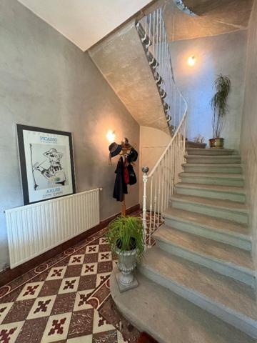Maison de charme au coeur d'un jardin arboré
