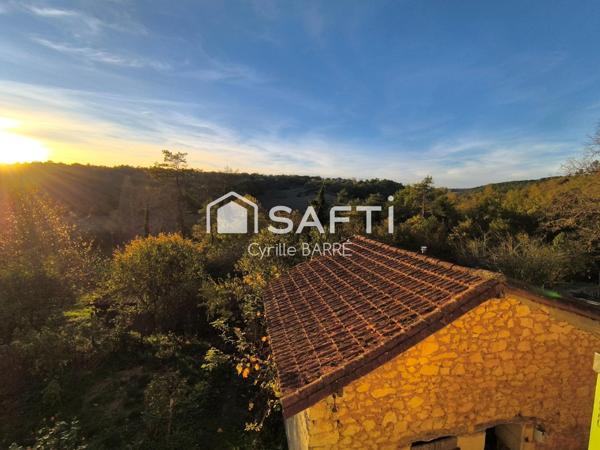 Maison en pierre avec vue et dépendances sur 2 ha