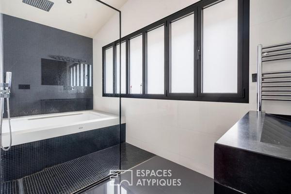 Deux maisons communicantes et un deux-pièces autour d’une cour privée