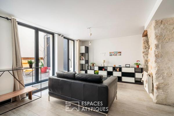 Deux maisons communicantes et un deux-pièces autour d’une cour privée