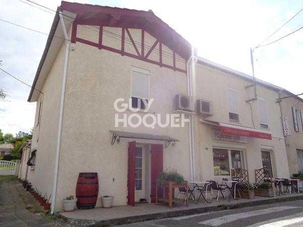 Maison d'habitation et fond de commerce 245 m2