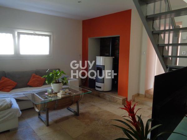 Maison d'habitation et fond de commerce 245 m2