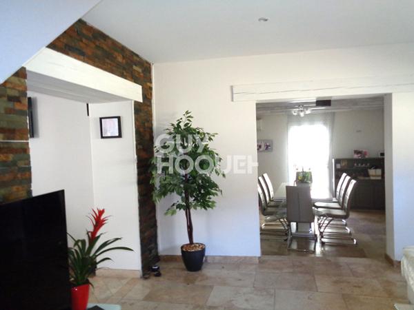 Maison d'habitation et fond de commerce 245 m2