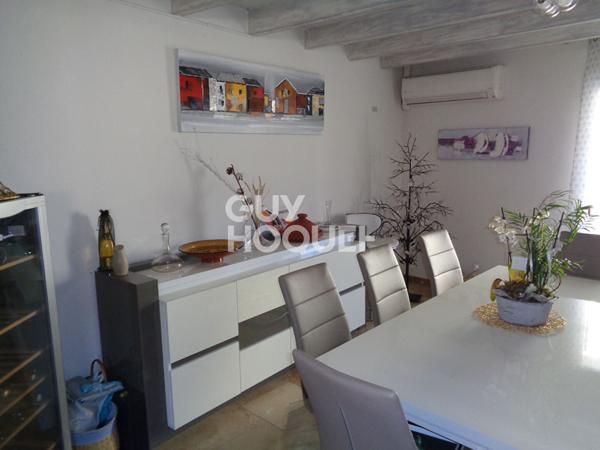 Maison d'habitation et fond de commerce 245 m2