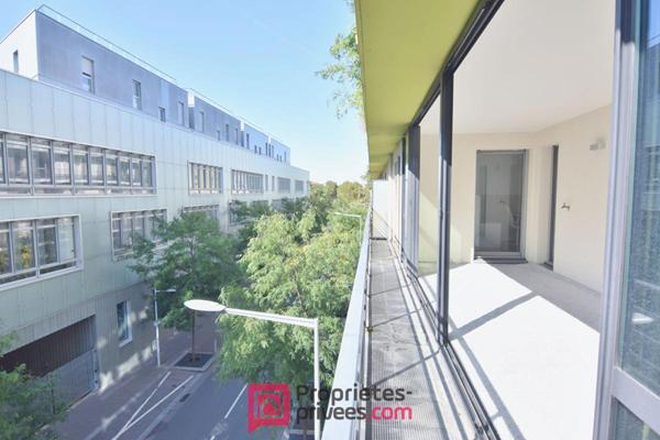 Appartement  3 pièces 66,03 m² Carrez  avec 18 m² de jardin d'hiver et 8 m² de balcon filant