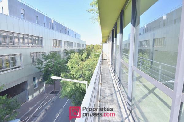 Appartement  3 pièces 66,03 m² Carrez  avec 18 m² de jardin d'hiver et 8 m² de balcon filant