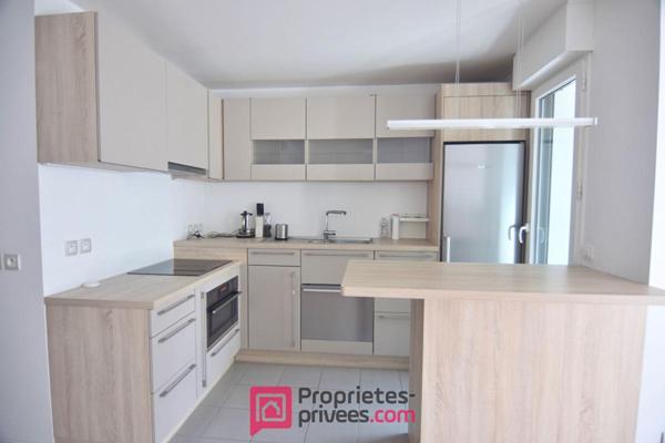 Appartement  3 pièces 66,03 m² Carrez  avec 18 m² de jardin d'hiver et 8 m² de balcon filant