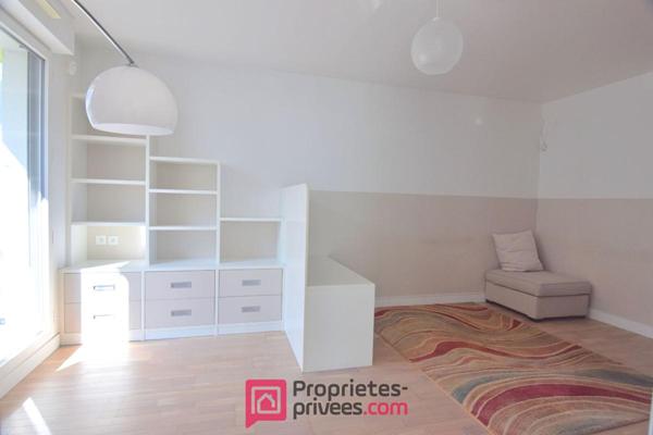 Appartement  3 pièces 66,03 m² Carrez  avec 18 m² de jardin d'hiver et 8 m² de balcon filant