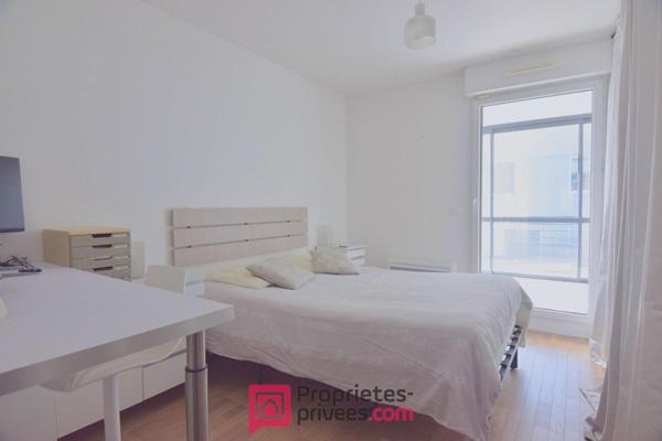 Appartement  3 pièces 66,03 m² Carrez  avec 18 m² de jardin d'hiver et 8 m² de balcon filant