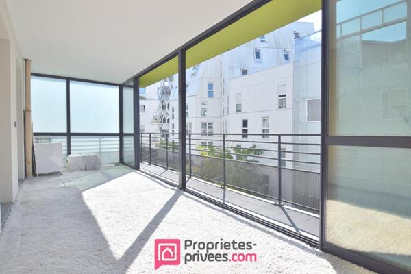 Appartement  3 pièces 66,03 m² Carrez  avec 18 m² de jardin d'hiver et 8 m² de balcon filant
