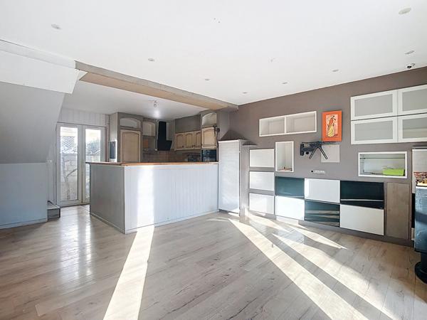 Maison de type 4 avec garage et jardin