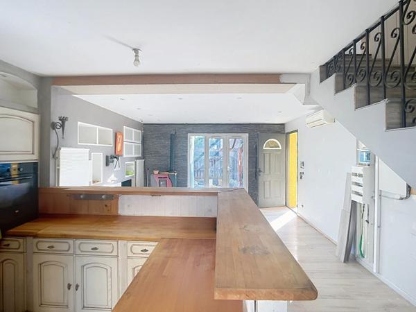 Maison de type 4 avec garage et jardin