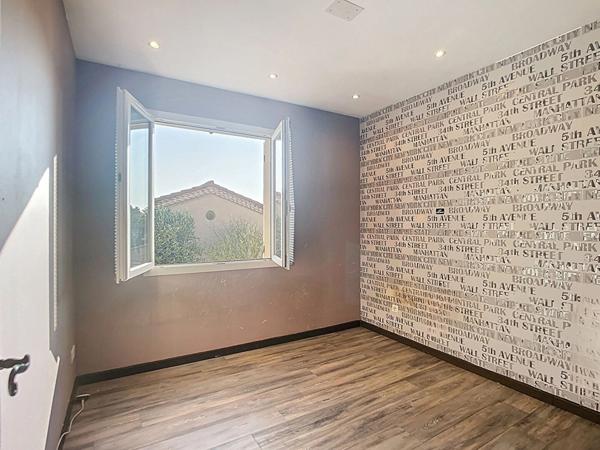 Maison de type 4 avec garage et jardin