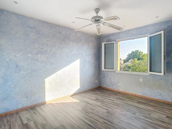 Maison de type 4 avec garage et jardin