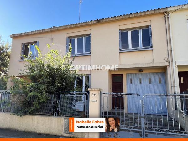 MAISON DES ANNEES 60, PROCHE CENTRE VILLE, JARDIN ET GARAGES.
