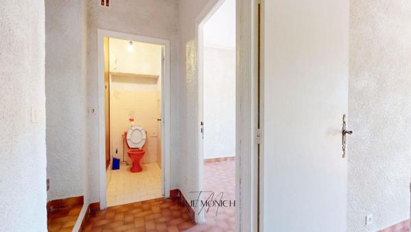 APPARTEMENT 2 CHAMBRES, CAVES, JARDIN