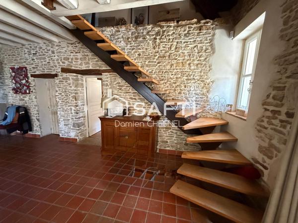 Propriété rare aux volumes remarquables et DPE C