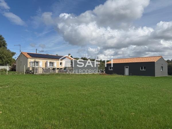 Maison de 2010 avec double garage et terrain spacieux
