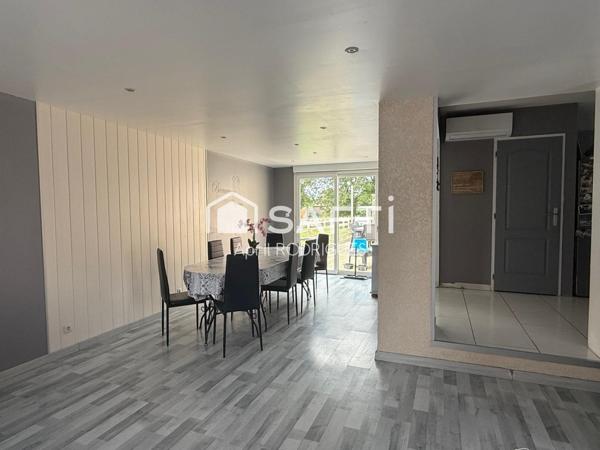 Maison de 2010 avec double garage et terrain spacieux