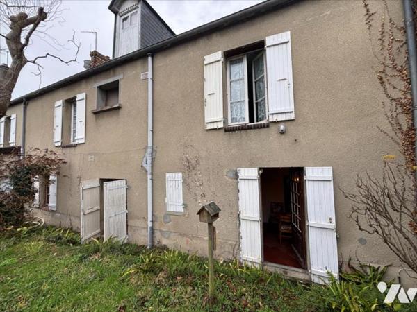 Maison d'habitation mitoyenne