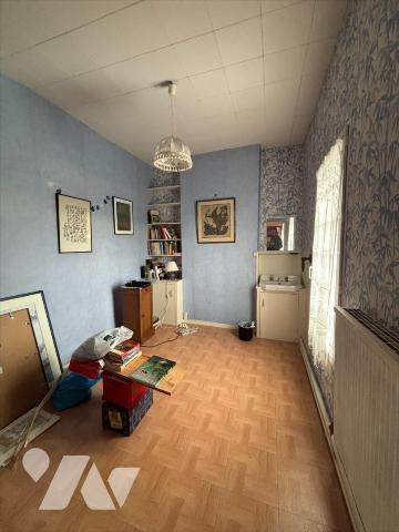 Maison d'habitation mitoyenne