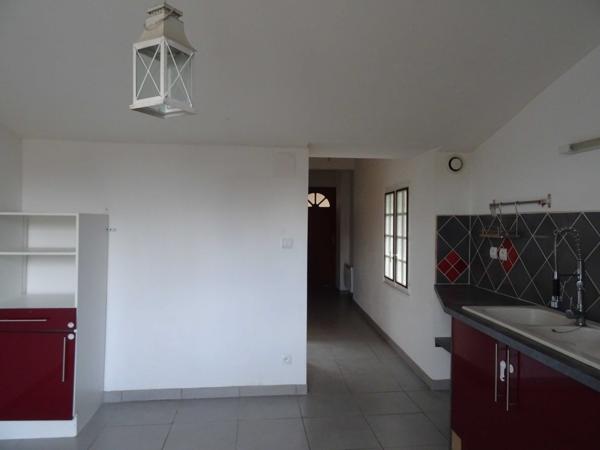 MAISON DE VILLAGE AVEC RAPPORT LOCATIF