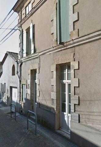 MARMANDE : maison de ville à vendre avec 4 chambres, terrasse et garage.
