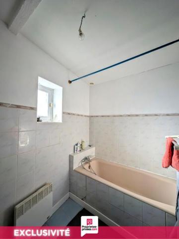 VENTE INTERACTIVE ! GARANTIE 12 MOIS INCLUS ! Maison de ville avec jardin et garage !