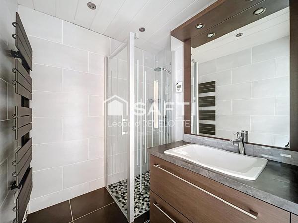 Superbe appartement avec jardin, garage, cave et parking