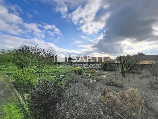 Superbe appartement avec jardin, garage, cave et parking