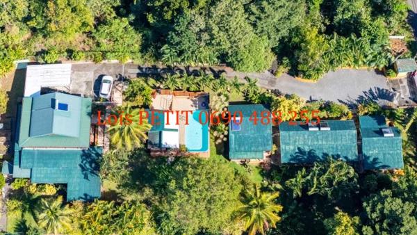 Vente / Maison et grand terrain à Bouillante (97125)
