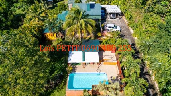 Vente / Maison et grand terrain à Bouillante (97125)