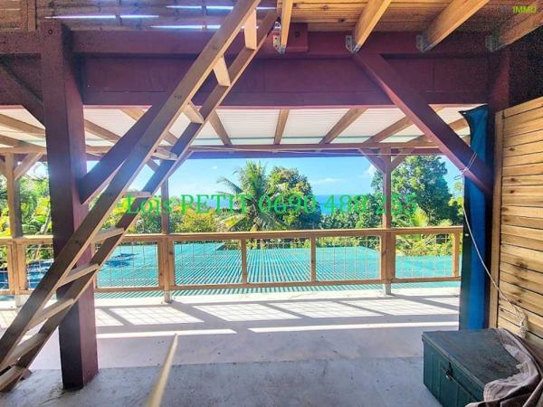 Vente / Maison et grand terrain à Bouillante (97125)
