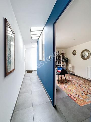 Maison de charme à vendre à Champtoceaux - 3 chambres, garage et extérieur.