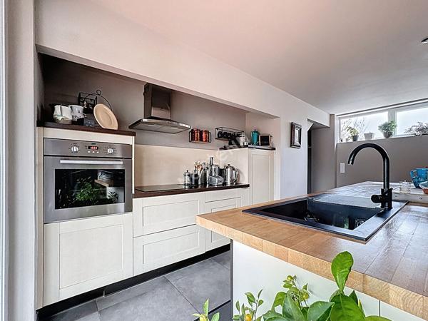 Maison de charme à vendre à Champtoceaux - 3 chambres, garage et extérieur.