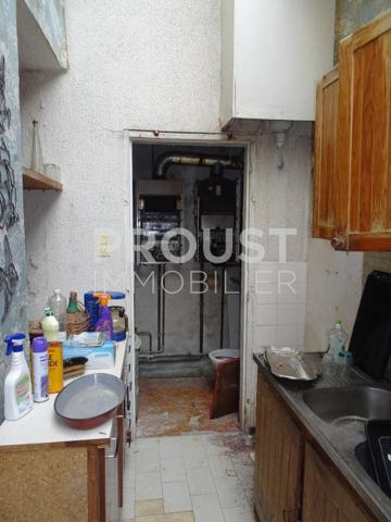 Centre ville de niort, maison en pierre d'environ 88 m² à rénover