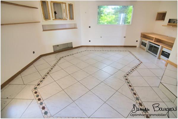 Maison individuelle T4 de 123 m² habitables avec sous-sol et grand terrain de 924 m²