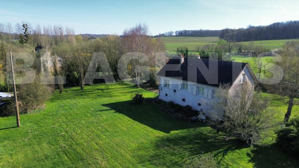 MAISON A FORT POTENTIEL – JOLI CADRE AVEC ETANG DE 1500m²
