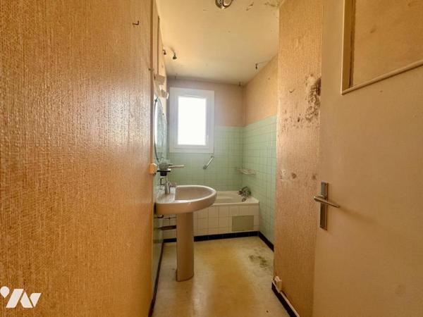 Appartement de type 3 avec cellier et stationnement garage