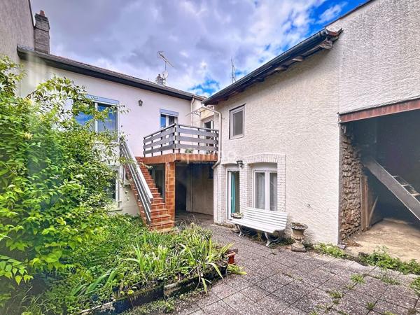 Maison avec jardin et local commercial