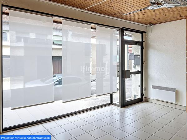 Maison avec jardin et local commercial