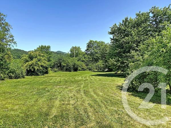Terrain à vendre  1210 m 2   OUST  - 09