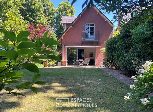 Maison meulière rénovée avec jardin et extensions dans un quartier recherché de Soisy-sur-Seine