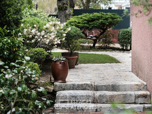 Maison meulière rénovée avec jardin et extensions dans un quartier recherché de Soisy-sur-Seine