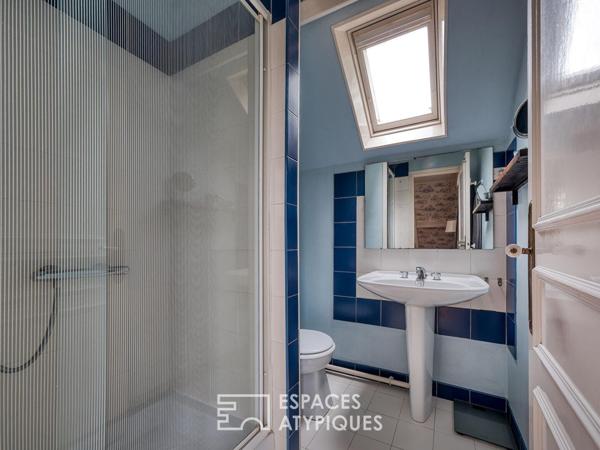 Maison meulière rénovée avec jardin et extensions dans un quartier recherché de Soisy-sur-Seine